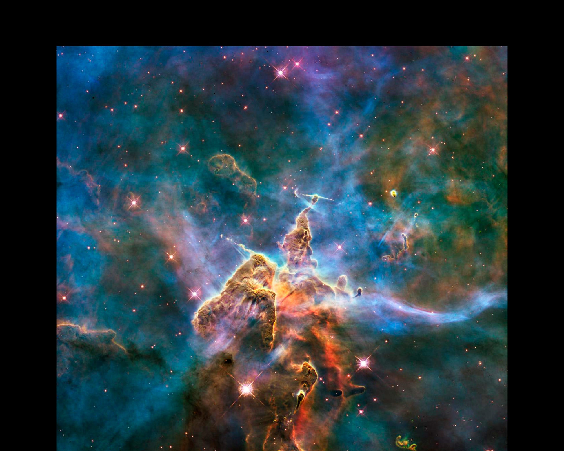 The image is a stunning cosmic scene featuring a vibrant nebula, a vast cloud of gas and dust in space. The nebula displays a stunning array of colors, including shades of blue, orange, and yellow, creating a mesmerizing and visually captivating display. The image is a captivating representation of the beauty and complexity of the universe, showcasing the intricate formations and patterns that exist within it.