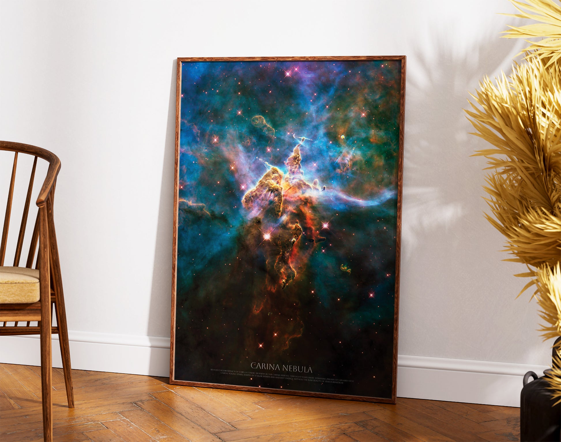 a large framed poster of the Carina Nebula, a stunning celestial object in the night sky.
